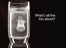 Glass of water with an Asprin floating in it